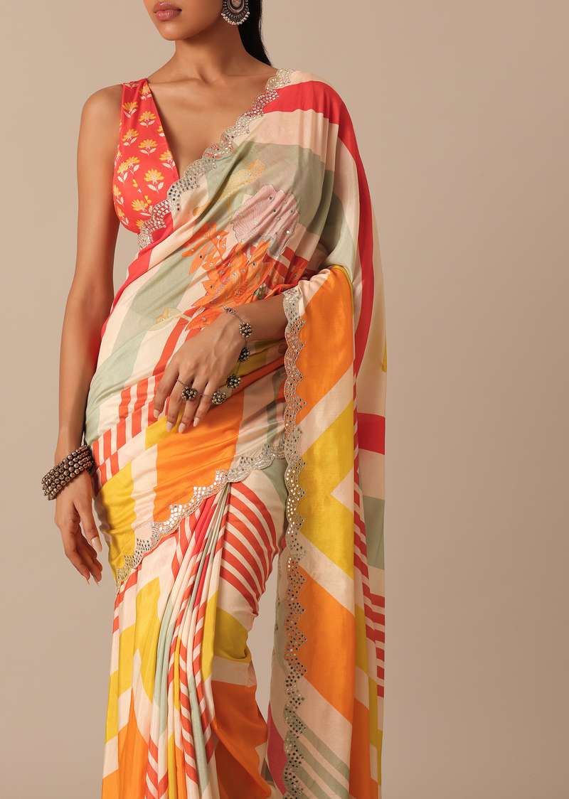 Orange Muslin Saree With Mirror Scallop Border And Unstitched Blouse Fabric