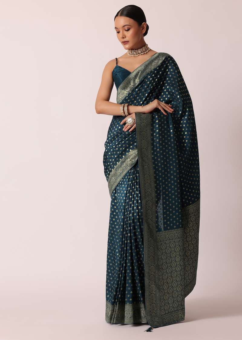Teal Dola Silk Saree With Woven Zari Pallu And Unstitched Blouse Piece