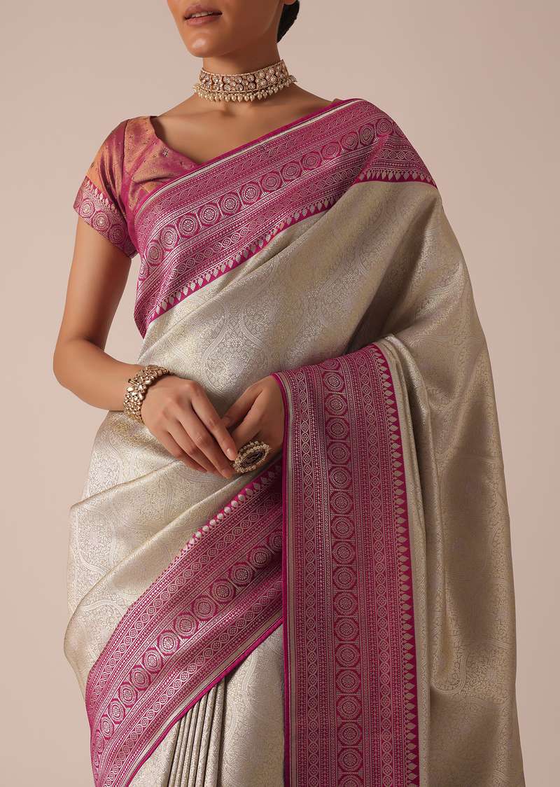Silver Silk Saree With Brocade Woven Contrast Border And Unstitched Blouse Piece