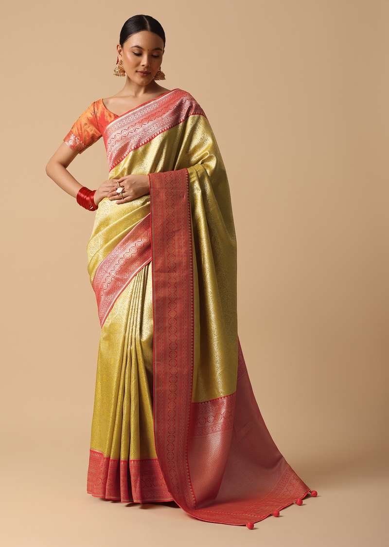 Yellow Brocade Silk Saree With Contrast Border And Unstitched Blouse